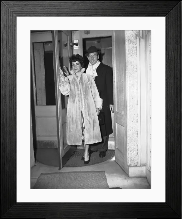 Framed Print : Michael Wilding and Liz Taylor Leave Building Framed Print : Michael Wilding and Liz Taylor Leave Building