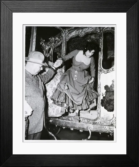 Framed Print : Jean Renoir Helps Anna Magnani from Coach Framed Print : Jean Renoir Helps Anna Magnani from Coach