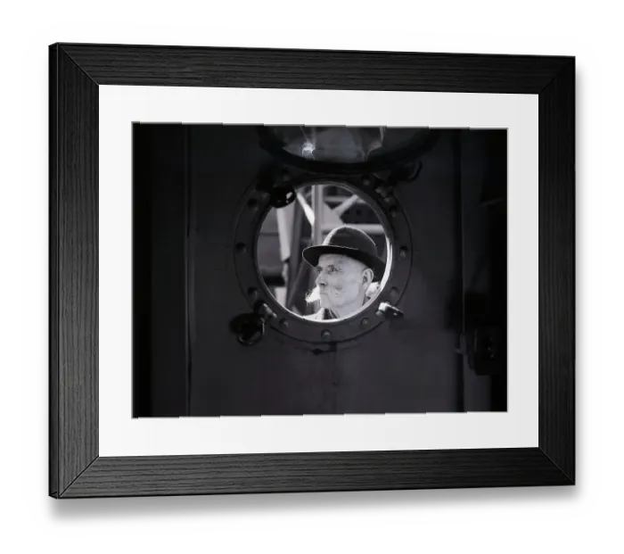 Framed Print : Immigrant Man Staring Through Porthole Framed Print : Immigrant Man Staring Through Porthole