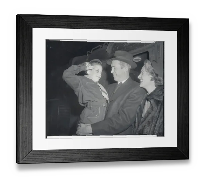 Framed Print : Actor James Stewart Holding Young Boy with Mrs. Stewart Nearby Framed Print : Actor James Stewart Holding Young Boy with Mrs. Stewart Nearby