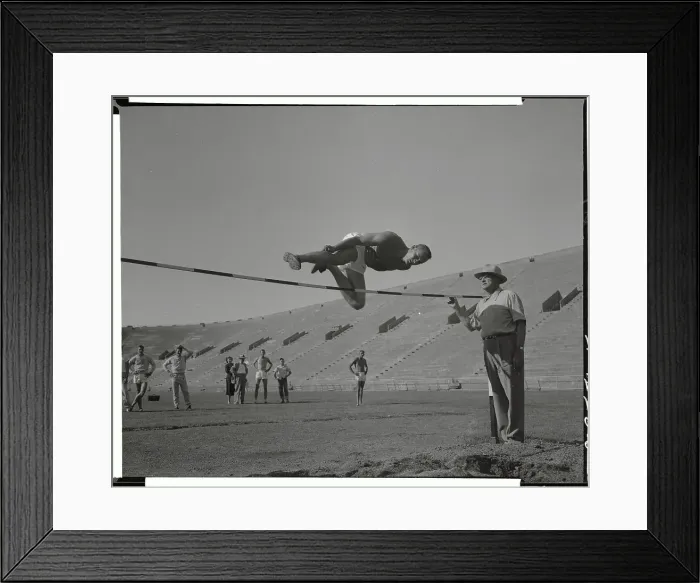 Framed Print : Arny Behon Jumping over High Bar Framed Print : Arny Behon Jumping over High Bar