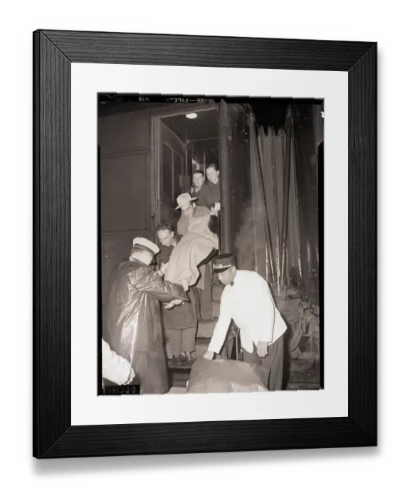 Framed Print : Sick Passenger Taken from Rescue Train