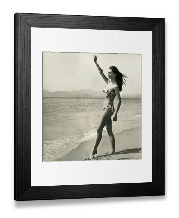 Framed Print : Brigitte Bardot Waving on the Beach Framed Print : Brigitte Bardot Waving on the Beach