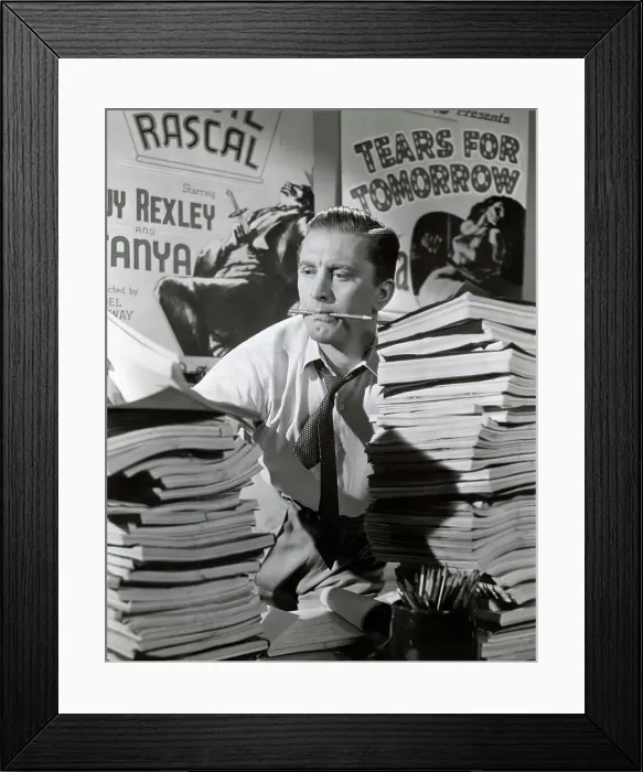 Framed Print : Kirk Douglas Struggles Piles Of Scripts Framed Print : Kirk Douglas Struggles Piles Of Scripts