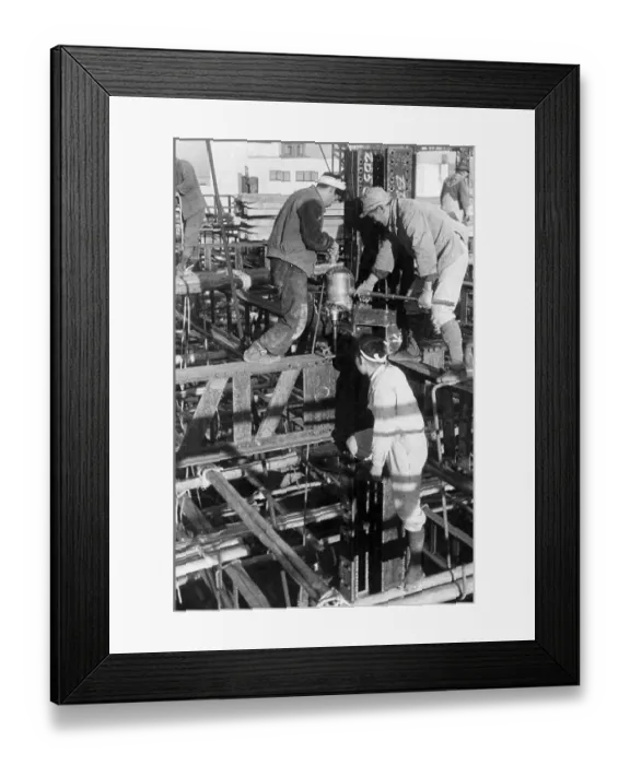 Framed Print : Japanese Riverts Work High Above Street Framed Print : Japanese Riverts Work High Above Street