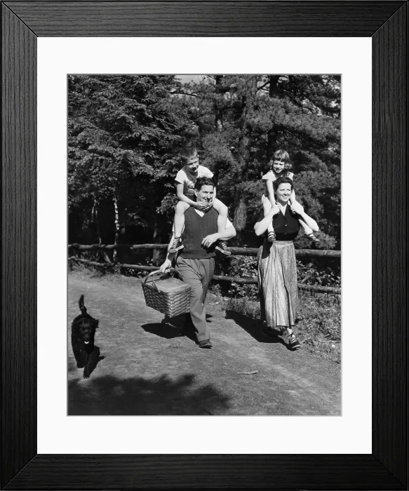 Framed Print : Parents Carrying Children for Picnic Framed Print : Parents Carrying Children for Picnic