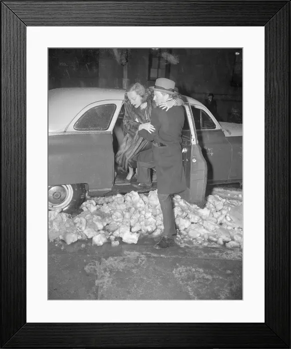 Framed Print : Man Helping Tallulah Bankhead Out of an Automobile Framed Print : Man Helping Tallulah Bankhead Out of an Automobile