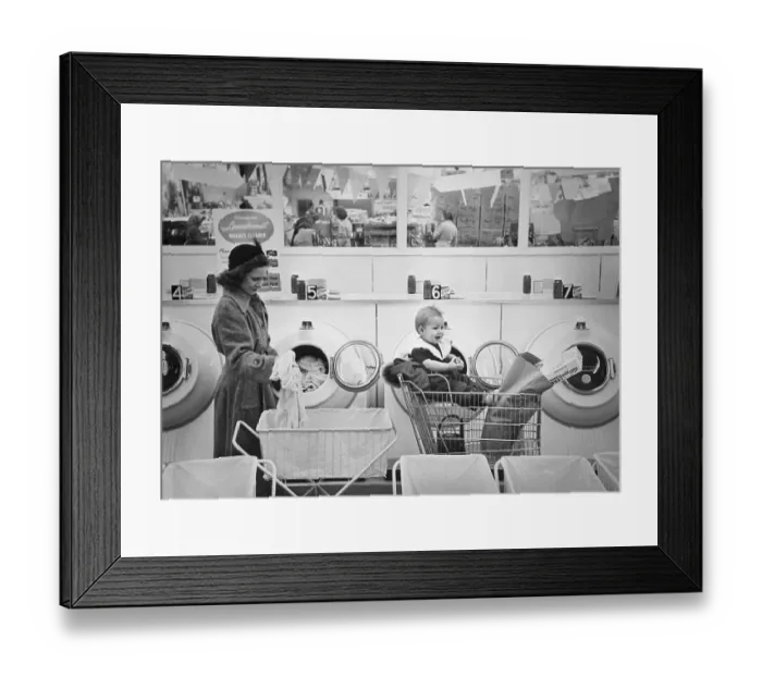 Framed Print : Woman Shopping While Doing Laundry Framed Print : Woman Shopping While Doing Laundry