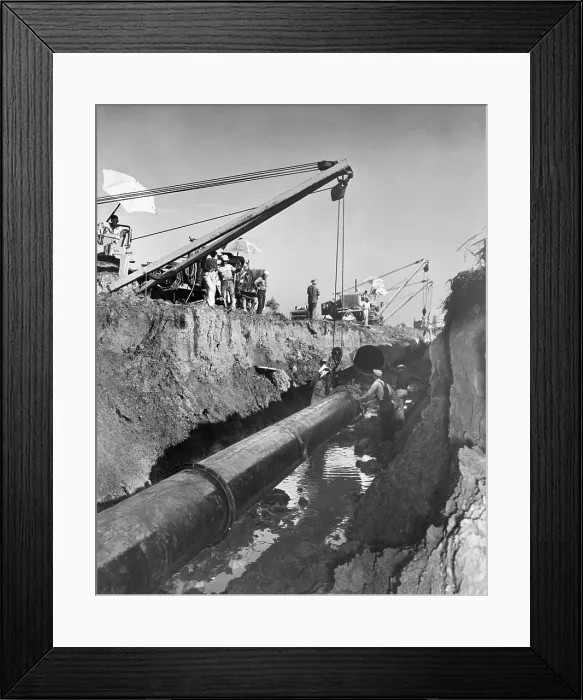Framed Print : Men In Trench Joining Pipeline Seam Framed Print : Men In Trench Joining Pipeline Seam