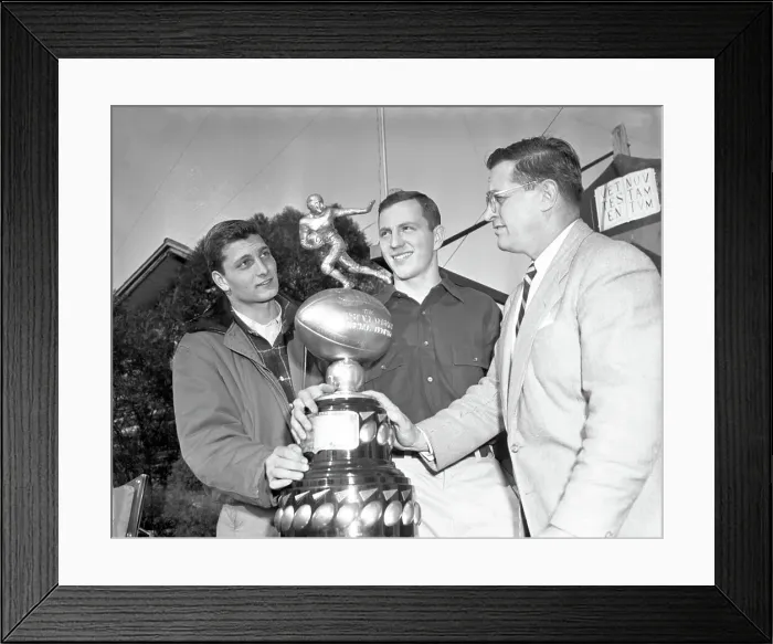 Framed Print : Football Players with Trophy Framed Print : Football Players with Trophy