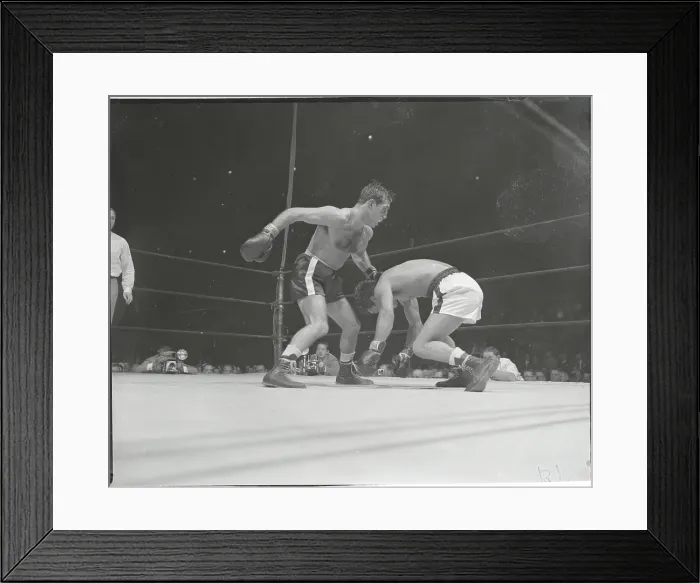 Framed Print : Boxer Chavez Falling from Punch by Paddy De Marco Framed Print : Boxer Chavez Falling from Punch by Paddy De Marco
