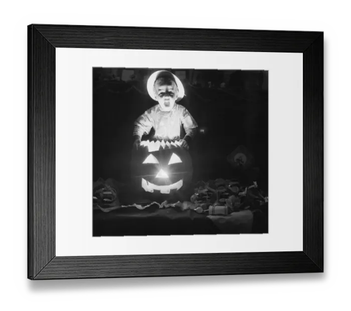 Framed Print : Boy with Jack-o-Lantern on Halloween