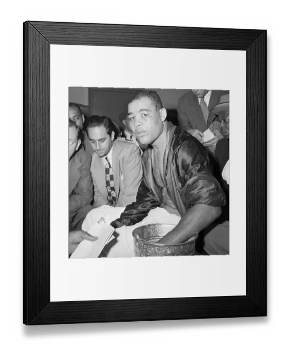 Framed Print : Joe Louis Bathing Hand in Bucket Framed Print : Joe Louis Bathing Hand in Bucket