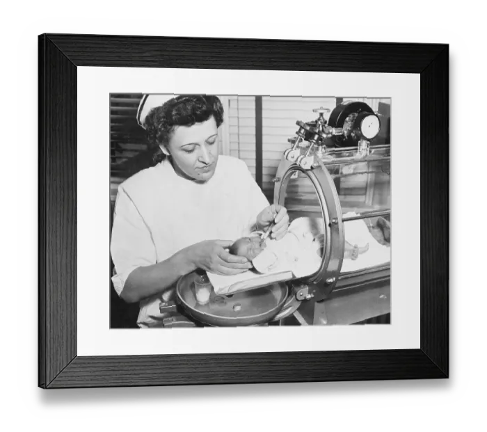 Framed Print : Nurse Feeding Premature Baby Framed Print : Nurse Feeding Premature Baby
