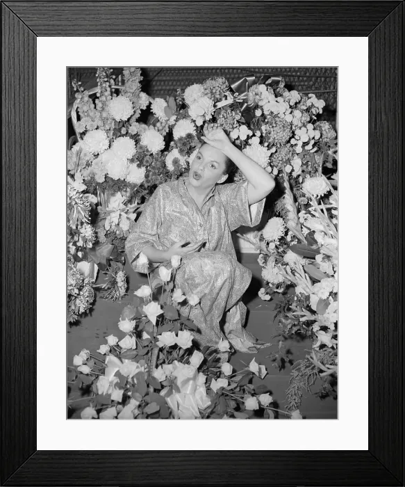 Framed Print : Judy Garland Posing with Flower Display Framed Print : Judy Garland Posing with Flower Display