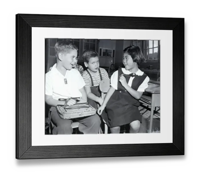 Framed Print : Student Shows Metal Tag To Classmates Framed Print : Student Shows Metal Tag To Classmates