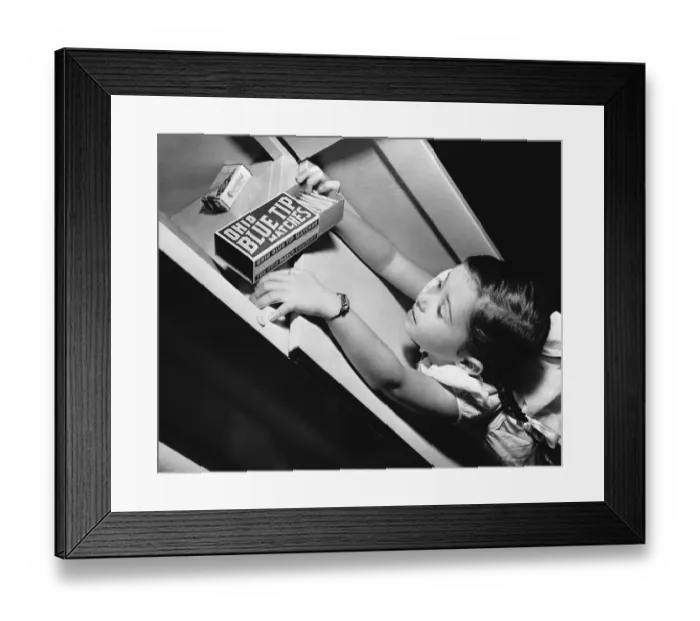Framed Print : Girl Pulling Matches Off Shelf Framed Print : Girl Pulling Matches Off Shelf
