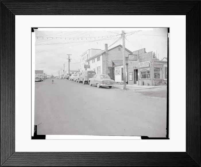 Framed Print : Cars Parked Along a Town Street Framed Print : Cars Parked Along a Town Street