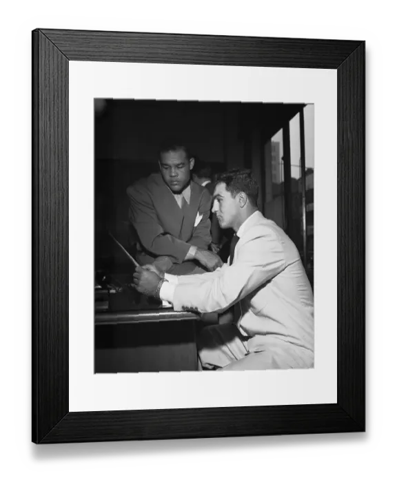 Framed Print : Joe Louis and Rocky Marciano Reading Papers Framed Print : Joe Louis and Rocky Marciano Reading Papers