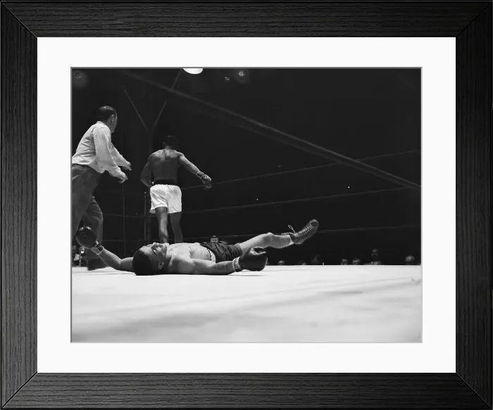 Framed Print : Boxer on Ground as Ray Robinson Walks Away