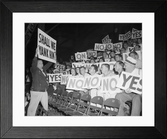 Framed Print : Man Holding Sign near Grandstand Audience Framed Print : Man Holding Sign near Grandstand Audience