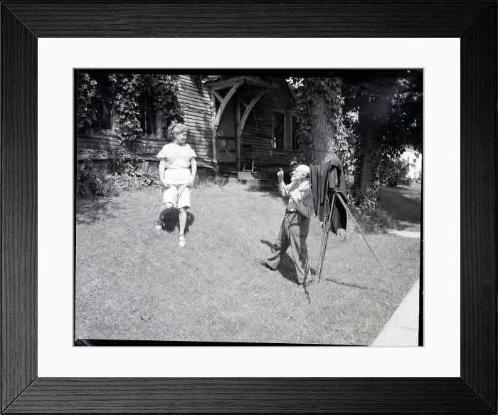 Framed Print : Aldrick Peoneer, Photographer, Sets Up Sho Framed Print : Aldrick Peoneer, Photographer, Sets Up Sho
