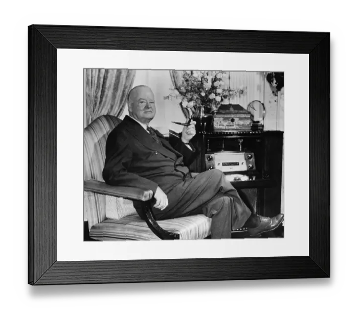 Framed Print : Herbert Hoover Seated in Chair with Pipe in Hand Framed Print : Herbert Hoover Seated in Chair with Pipe in Hand