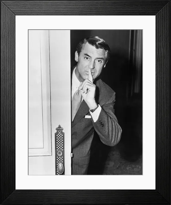 Framed Print : Cary Grant With Finger to Mouth Framed Print : Cary Grant With Finger to Mouth