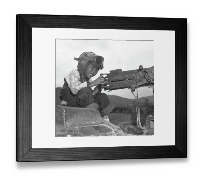 Framed Print : 24th Infantry Division's Adopted Child Al Pretends To Shoot On A Tank Framed Print : 24th Infantry Division's Adopted Child Al Pretends To Shoot On A Tank