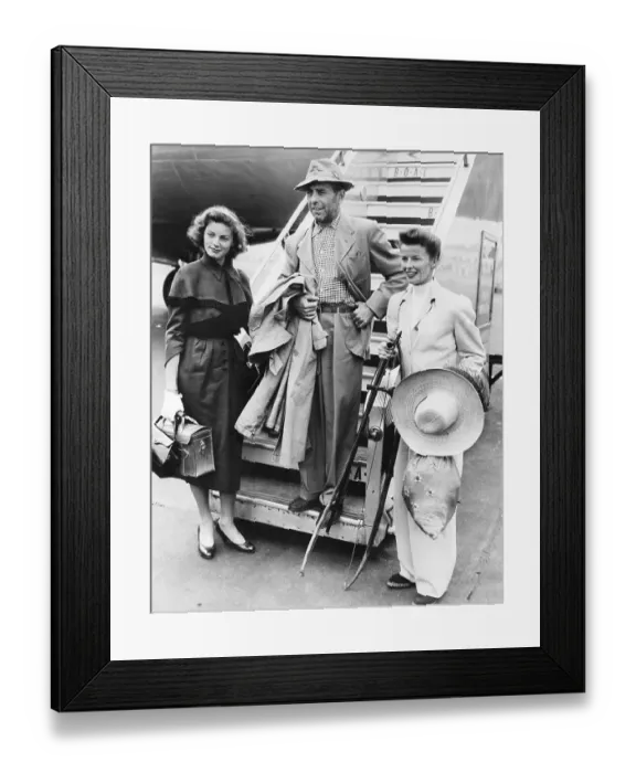 Framed Print : Bogart, Bacall, and Hepburn Return from Filming
