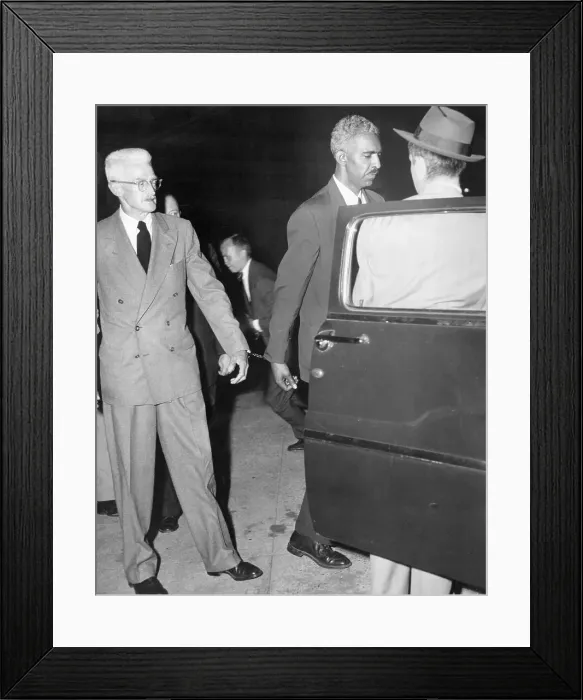 Framed Print : Author Dashiel Hammett and Acquaintance Being Transported by Police Framed Print : Author Dashiel Hammett and Acquaintance Being Transported by Police