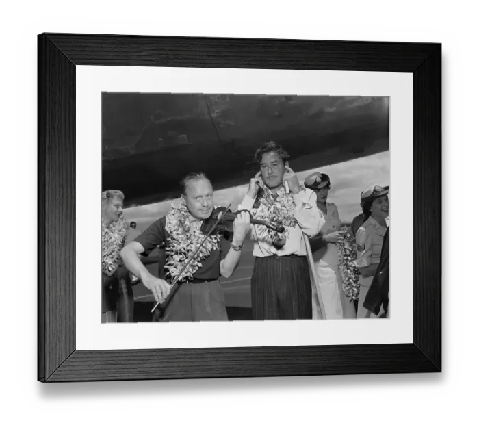 Framed Print : Jack Benny Playing Violin While Errol Flynn Covers Ears Framed Print : Jack Benny Playing Violin While Errol Flynn Covers Ears