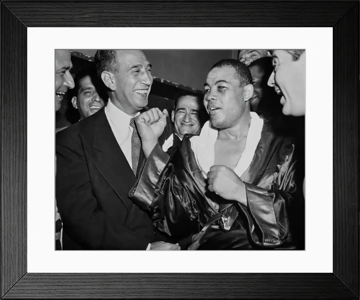 Framed Print : Joe Louis. Heavyweight champion Joe Louis (1914 - 1981) raising his right