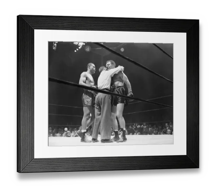 Framed Print : Referee Comforting Lee Savold After Joe Louis Win Framed Print : Referee Comforting Lee Savold After Joe Louis Win