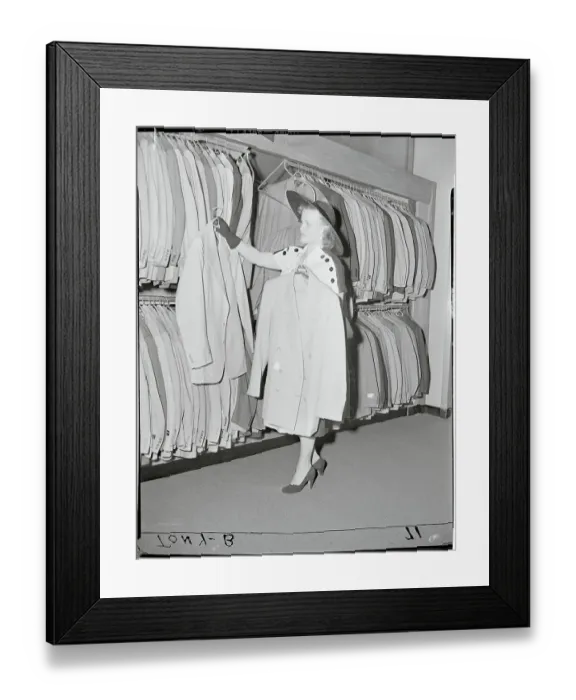 Framed Print : Woman Shopping for a Suit Framed Print : Woman Shopping for a Suit