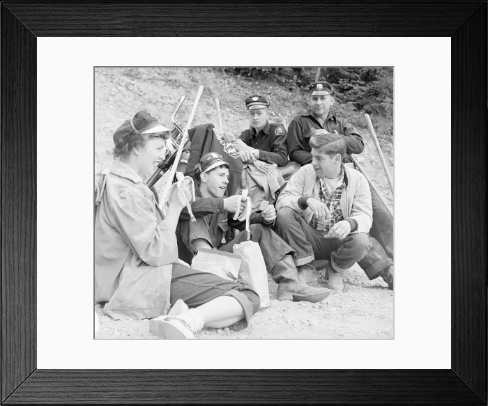 Framed Print : Motorcyclists Seated Eating Bananas Framed Print : Motorcyclists Seated Eating Bananas