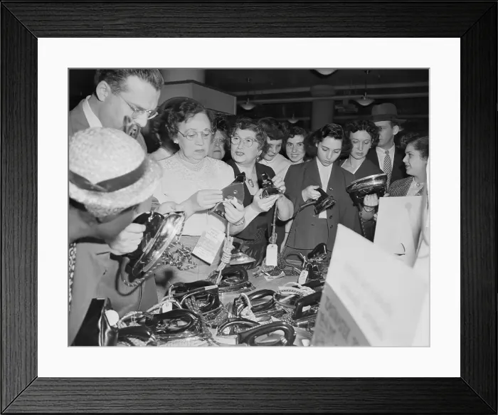 Framed Print : Women Shopping for Irons Framed Print : Women Shopping for Irons