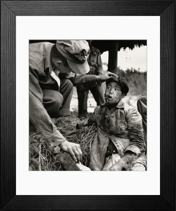 Framed Print : US Navy Medic With Injured Korean Boy Framed Print : US Navy Medic With Injured Korean Boy