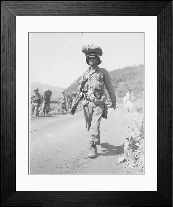 Framed Print : Soldier Carrying Equipment atop Head Framed Print : Soldier Carrying Equipment atop Head