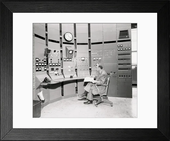 Framed Print : Scientist Sitting in Atomic Control Room Framed Print : Scientist Sitting in Atomic Control Room