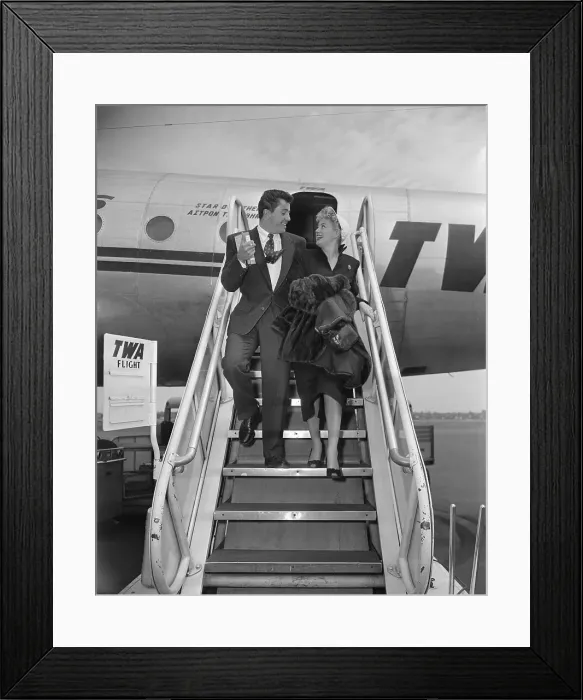 Framed Print : Shelley Winters and Farley Granger Walking down Airplane Steps Framed Print : Shelley Winters and Farley Granger Walking down Airplane Steps
