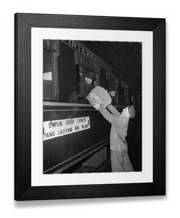 Framed Print : Man Handing Box to Porter on Train Framed Print : Man Handing Box to Porter on Train