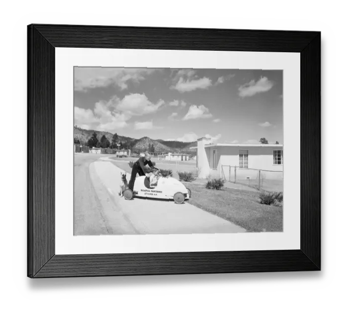 Framed Print : Two Boys Playing with Soap Box Car Outside Home