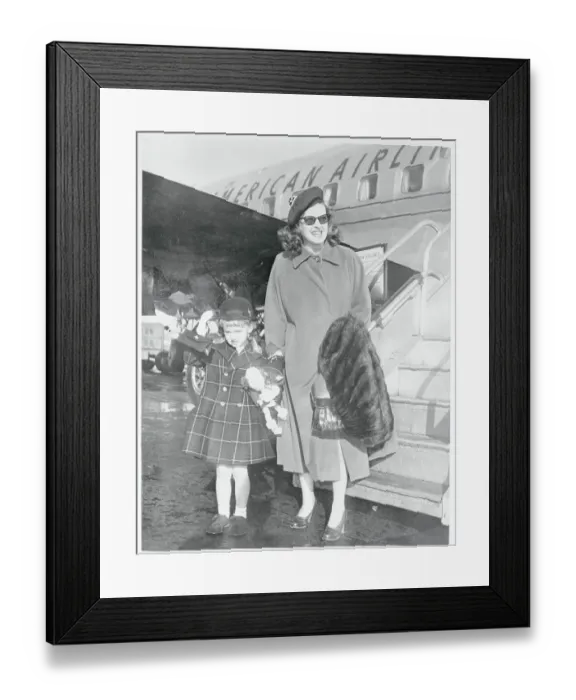 Framed Print : Actress Bette Davis Pausing With Daughter Near Airplane Framed Print : Actress Bette Davis Pausing With Daughter Near Airplane