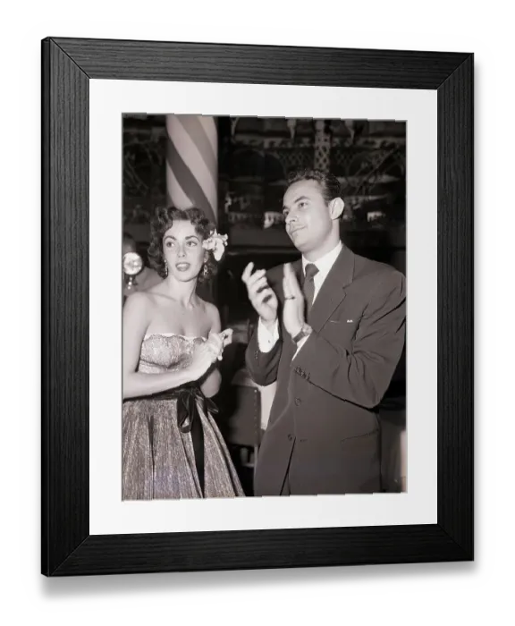 Framed Print : Elizabeth Taylor and Stanley Donen Applaud