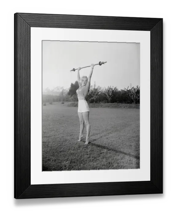 Framed Print : Marilyn Monroe Exercising on Grass Framed Print : Marilyn Monroe Exercising on Grass