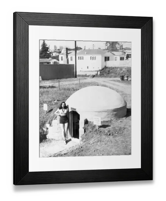 Framed Print : Woman Modeling a Bomb Shelterr Framed Print : Woman Modeling a Bomb Shelterr