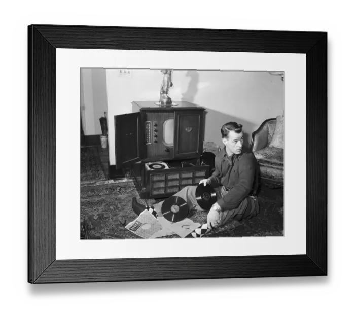 Framed Print : Gordon Howe Seated on Floor With Records Framed Print : Gordon Howe Seated on Floor With Records