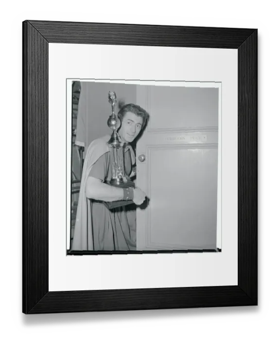 Framed Print : Gregory Peck Holding a Trophy Framed Print : Gregory Peck Holding a Trophy
