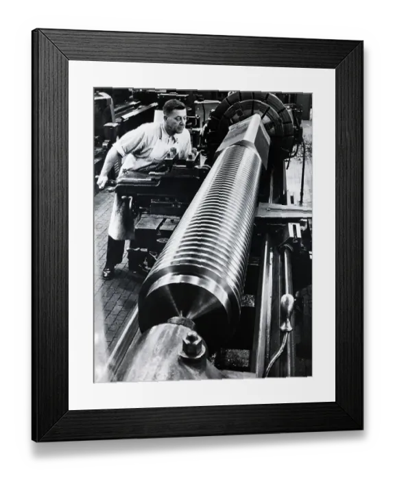 Framed Print : A Very Large Screw Bieng Threaded Framed Print : A Very Large Screw Bieng Threaded
